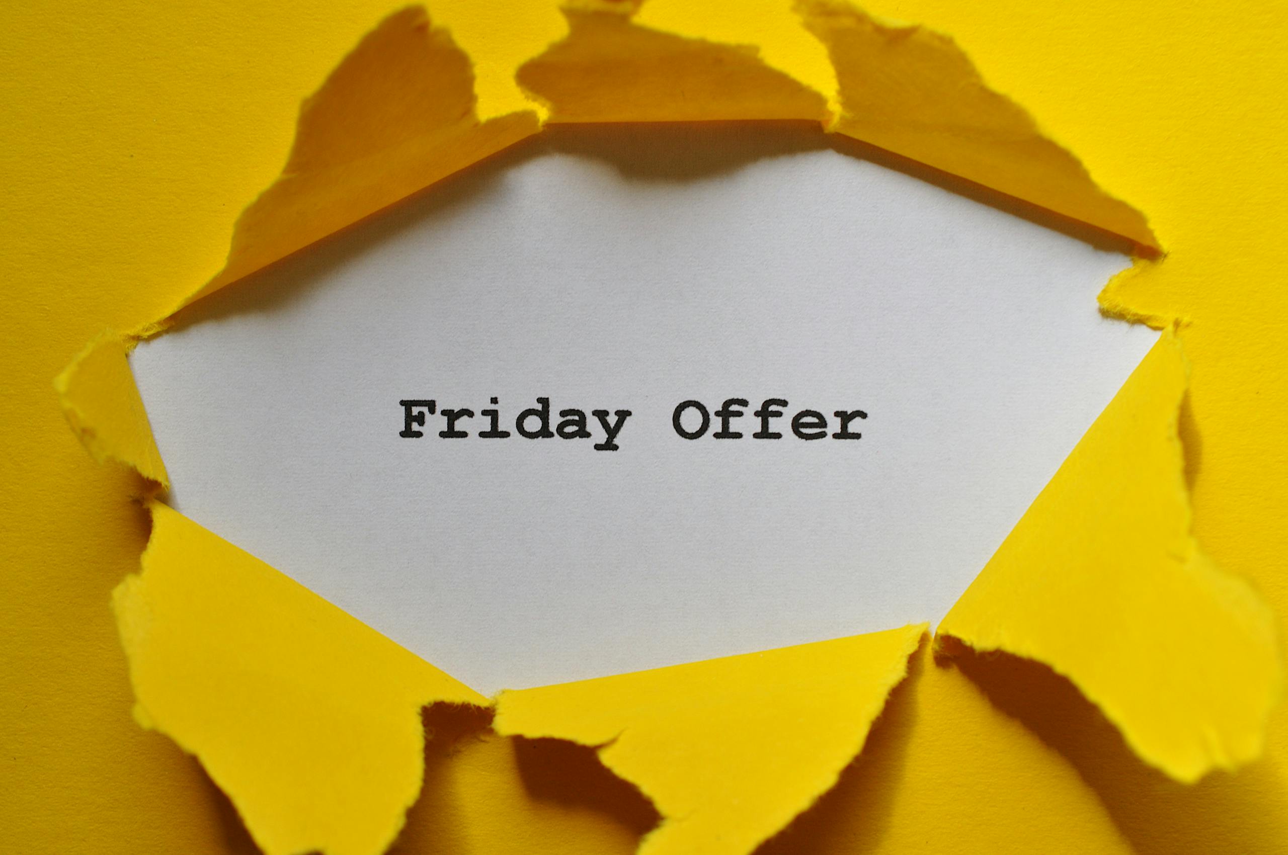 Photo by Adriana Beckova Eye-catching torn paper with Friday Offer text for promotions.